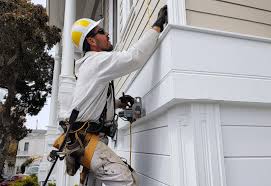 How To Choose The Right Materials for Your Siding Installation in 'Melville, RI